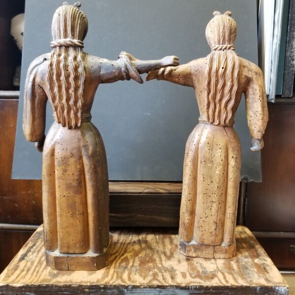 Antique wormwood carved wooden statues of women with braided hair