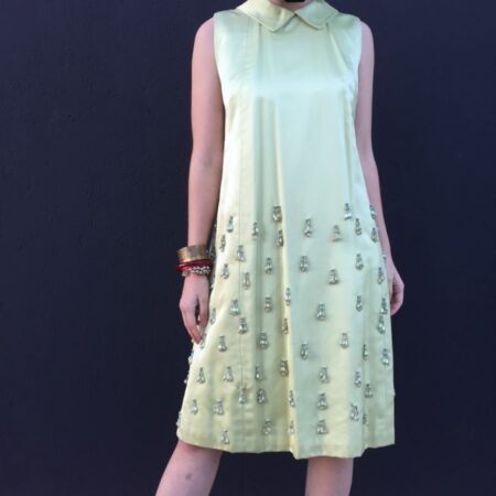 Vintage green silk cocktail dress with beaded trim