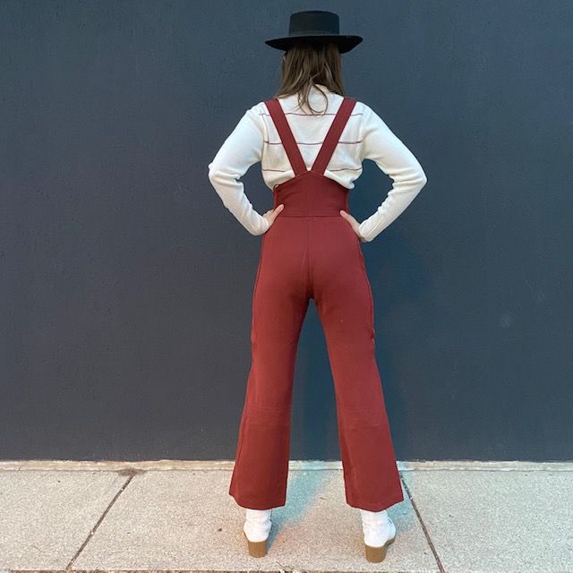 Maroon ski pants with burgundy racer stripe