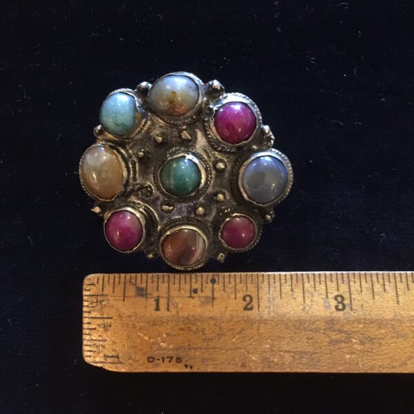 Brooch with ruler for size