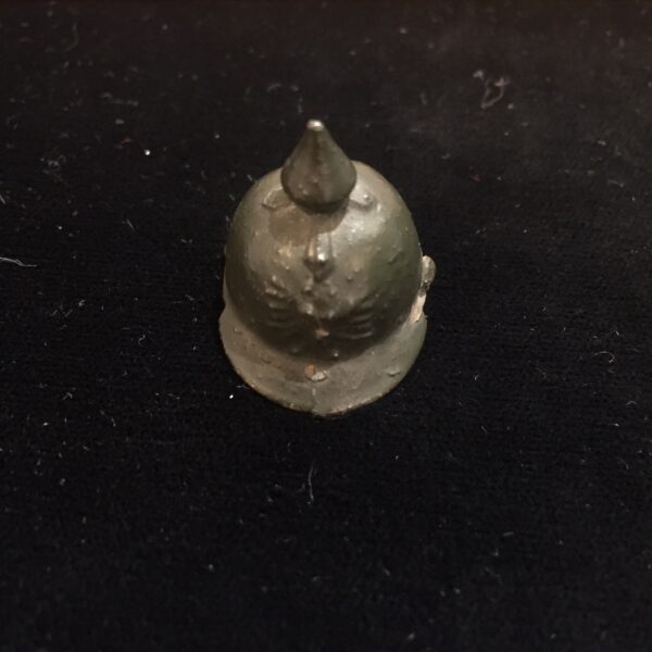 Spiked or pickelhaube helmet used late 19th to early 20th century. Possibly Austrian insignia.