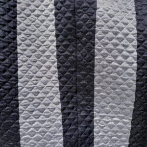 closeup of Geoffrey Beene quilted striped jacket