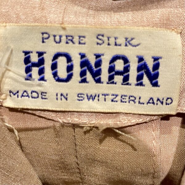 1940s pink silk womans suit label