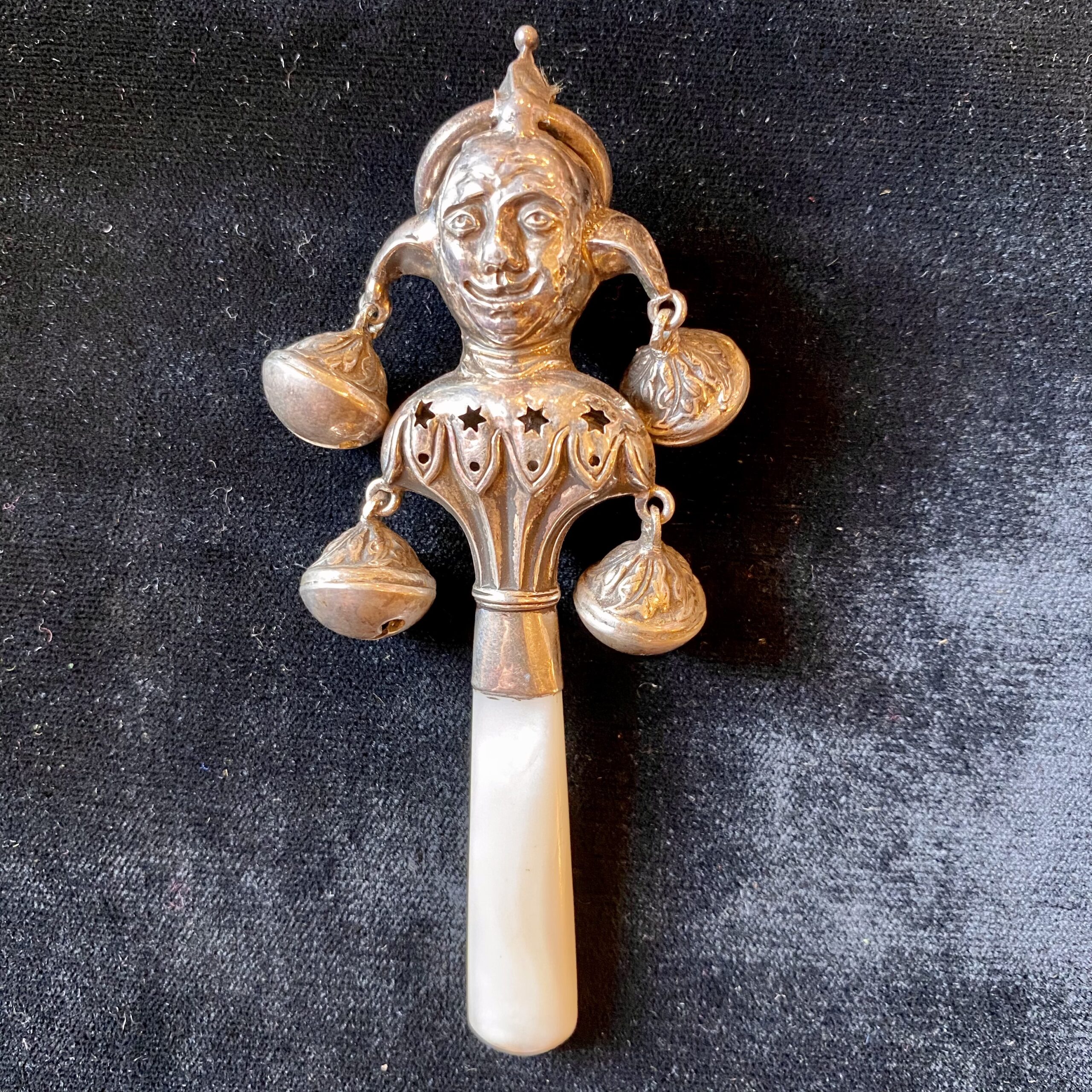 figural jester baby rattle