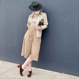 Woman in Vynl jacket and culottes