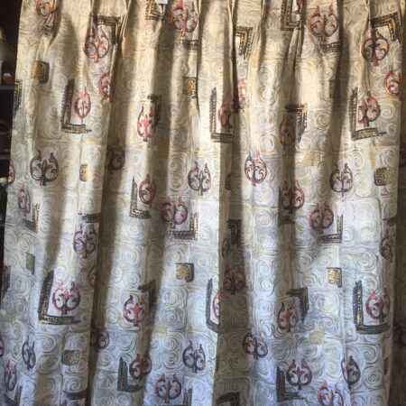 Bark cloth style fabric pair of curtains and valance. Panels are each 42” wide by 74”