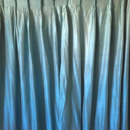 Pair of peacock blue silk curtains. Lined
