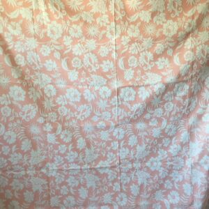 Coral and white bedspread