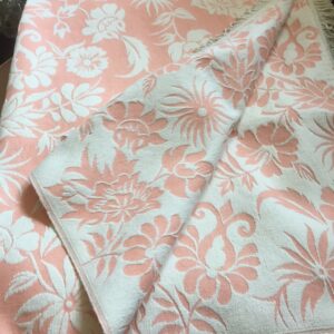 Coral and white bedspread