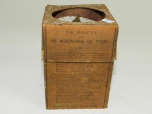 Antique Sundial in a box with poetry written on the side