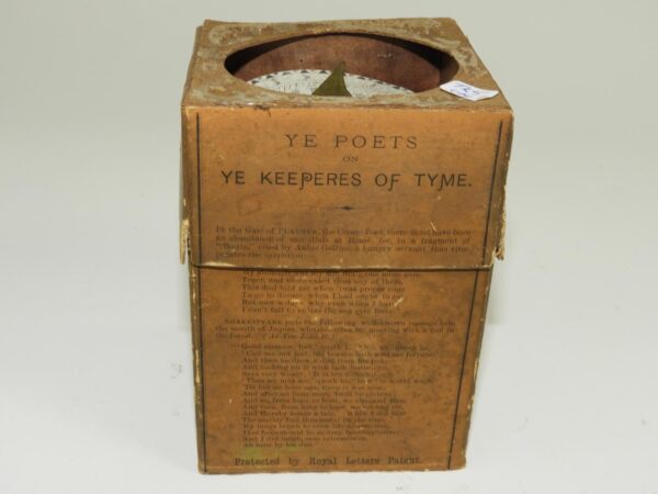Antique Sundial in a box with poetry written on the side