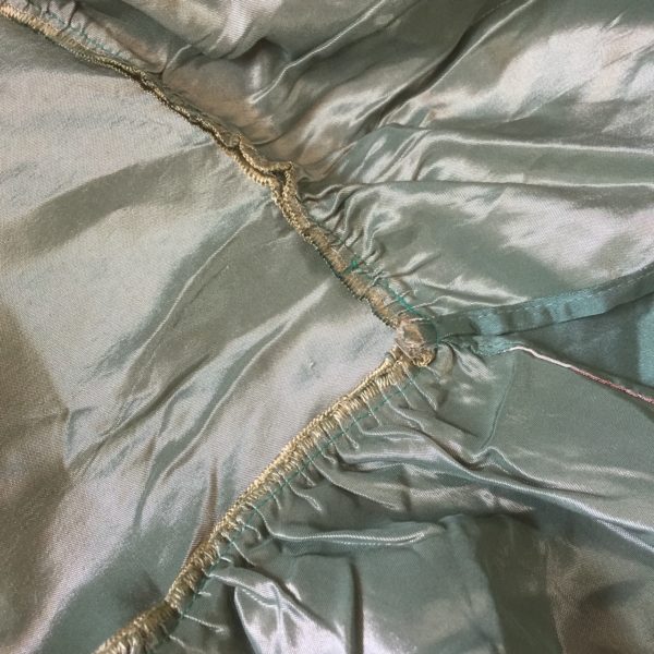 Green poly-satin bedspread