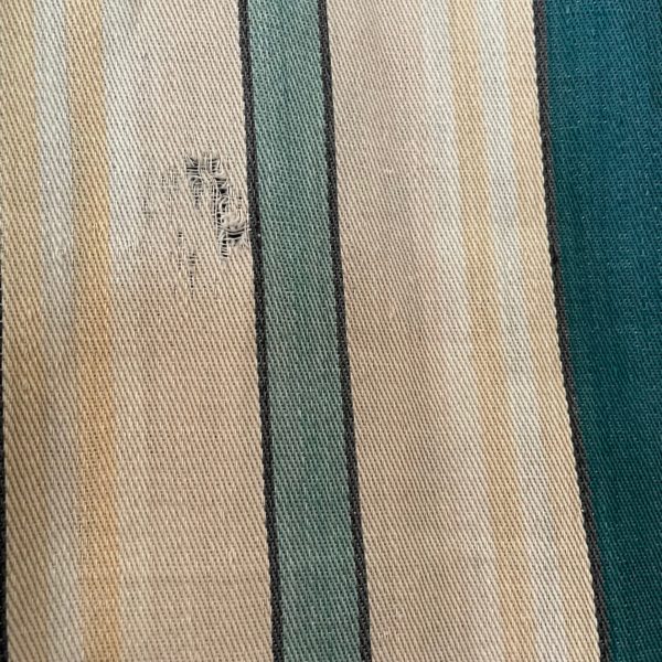 Single striped vintage curtain panel. Some staining and damage. Metal rings at the top. Approximate size 39” wide by 79” long. $115. One piece only