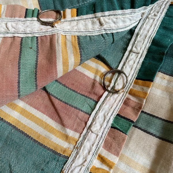 Single striped vintage curtain panel. Some staining and damage. Metal rings at the top. Approximate size 39” wide by 79” long. $115. One piece only