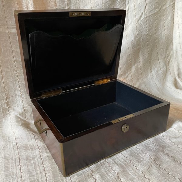 Dressing or writing case by I Terrell, 250 Regent St., London,England. Beautiful burled finish with ormaleaux and mother of pearl inlays. Lined in a dark blue textured leather