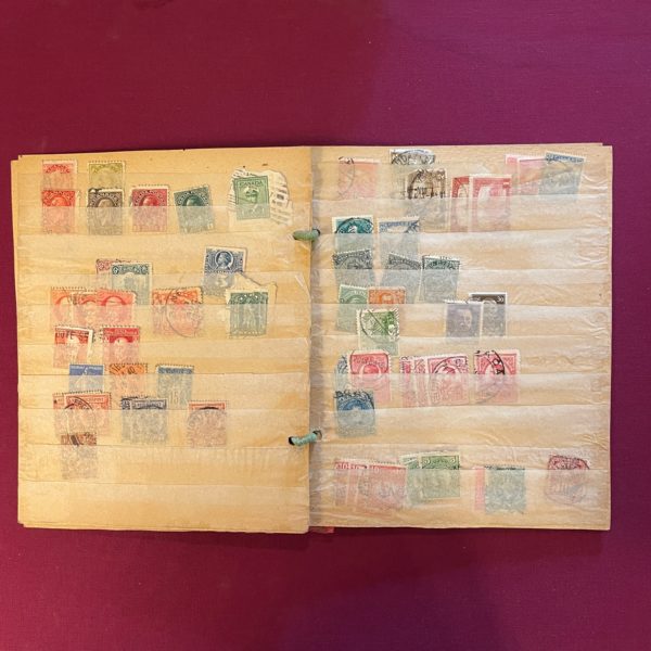 Home made stock book Over 70 stamps late 1890’s to WWII