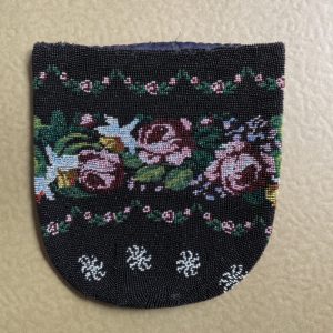 Lined beaded bag with rose motif