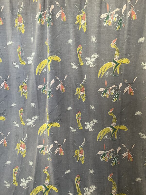 vintage 1950's curtains with repeating modernist Don Quixote print