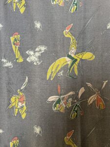 vintage 1950's curtains with repeating modernist Don Quixote print