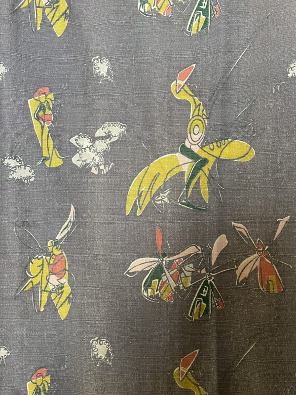 vintage 1950's curtains with repeating modernist Don Quixote print
