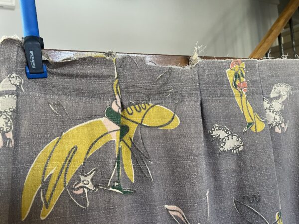 vintage 1950's curtains with repeating modernist Don Quixote print
