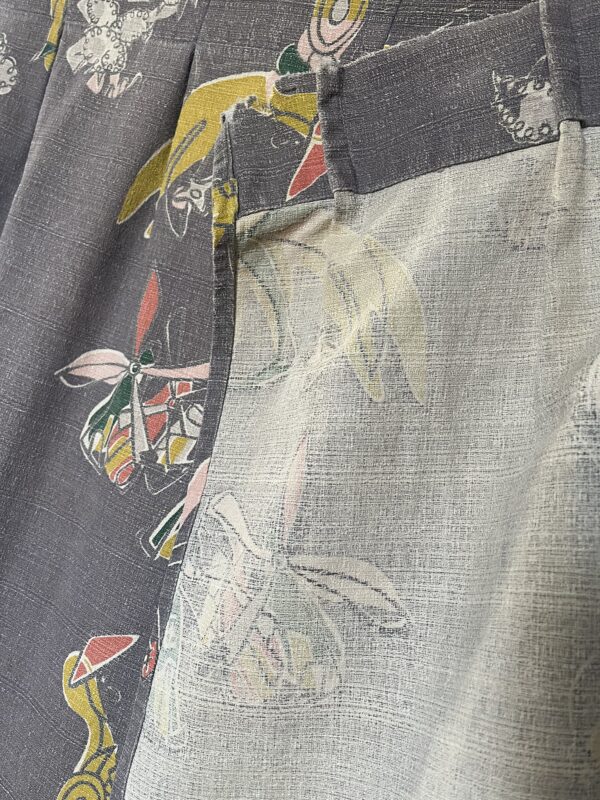 vintage 1950's curtains with repeating modernist Don Quixote print