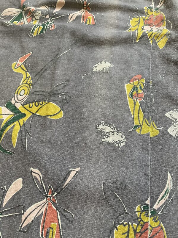 vintage 1950's curtains with repeating modernist Don Quixote print